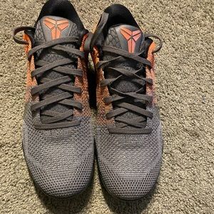 Kobe’s XI Easter. Gray, white and orange with mesh material. Excellent condition